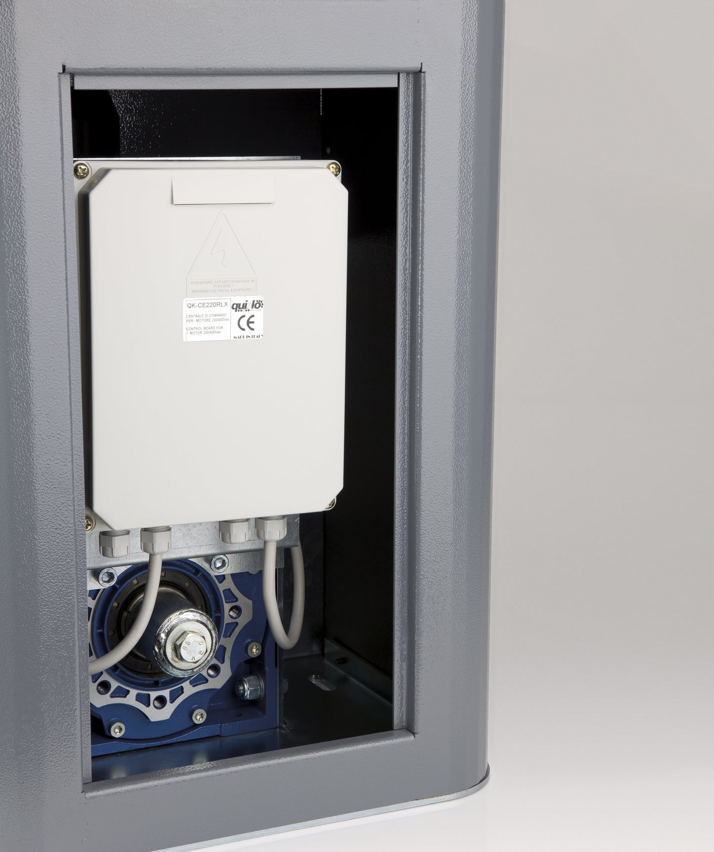 Quiko Titano 4000KG Industrial Sliding Gate Operator showing gear and electrical components.