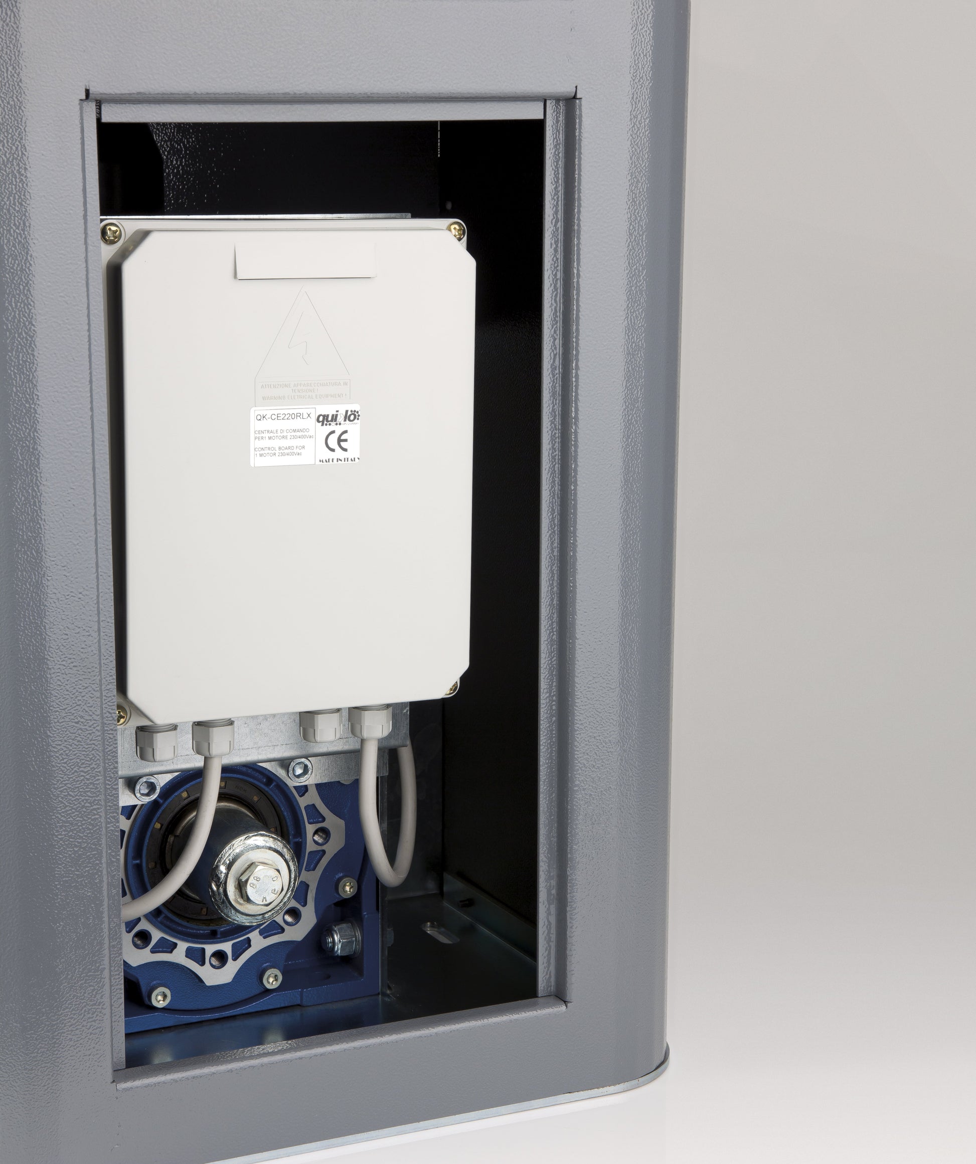 Quiko Titano 4000KG Industrial Sliding Gate Operator showing gear and electrical components.