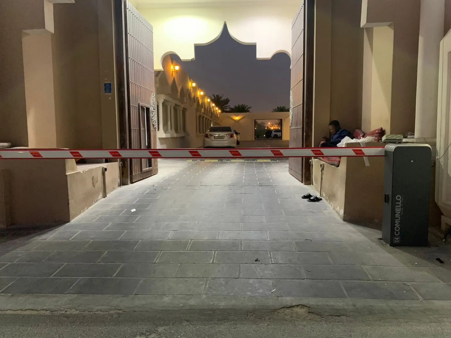 Comunello automatic barrier installation at a residential entrance in Qatar
